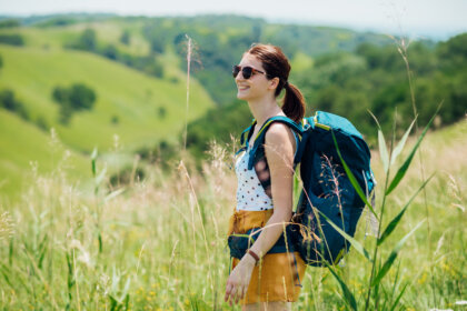 Young woman enjoying her mountain vacation